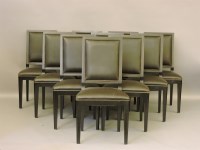 Lot 688 - A set of ten modern leather and stained wood dining chairs