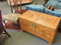 Lot 691 - An Oriental camphor wood chest