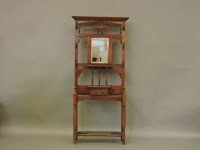 Lot 718 - A Victorian walnut hall stand