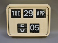 Lot 505 - A 1960s Grayson office calendar and clock