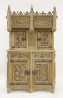 Lot 418 - A French oak 'medieval' three-tier buffet