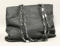Lot 429 - A Prada black canvas handbag