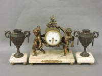 Lot 152 - A 19th century French gilt spelter clock garniture
