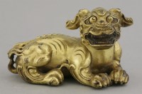 Lot 468 - A gilt bronze Buddhist lion