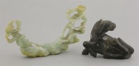 Lot 540 - A Chinese jade carving of two monkeys on opposing branches