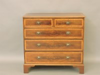 Lot 396 - A George III crossbanded chest of drawers