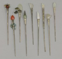 Lot 212 - A collection of nine Hairpins