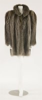 Lot 1112 - A raccoon mid-length fur coat