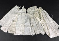 Lot 1205 - A large collection of 19th century cotton petticoats and undergarments (qty.)