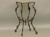 Lot 752 - A late 19th century decorative iron plant table