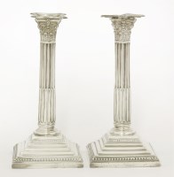 Lot 47 - A pair of silver candlesticks