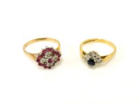 Lot 16 - A 9ct gold ruby and diamond cluster ring