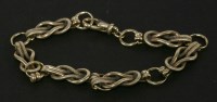 Lot 89 - A 9ct gold knot link chain bracelet