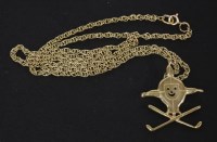 Lot 153 - A 9ct gold jester pendant
