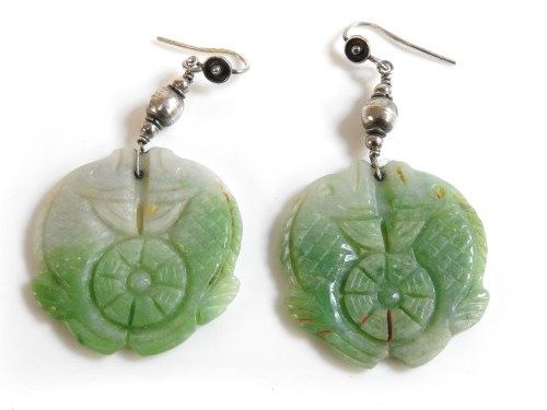 Lot 173 - A pair of jade carved earrings