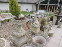 Lot 3010 - A pair of Haddonstone garden urns on square plinths