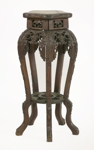 Lot 228 - A Chinese wood vase stand