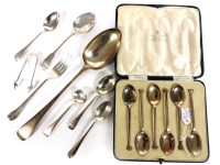 Lot 107 - A cased set of six Mappin & Webb coffee spoons