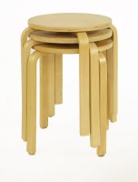 Lot 604 - A set of three birch 'E60' stools