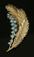 Lot 216 - An Italian gold and turquoise spray brooch