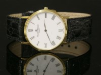 Lot 371 - A gentlemen's 18ct gold Baume et Mercier Genève quartz strap watch