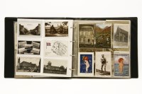 Lot 224 - A large album of topographical postcards