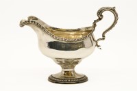 Lot 176 - A George III silver sauce boat
