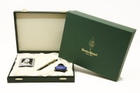 Lot 135 - A Conway Stewart limited edition 18ct gold fountain pen with Churchill quote book and blue ink