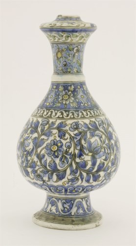 Lot 12 - A Persian pottery wine bottle