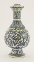 Lot 12 - A Persian pottery wine bottle