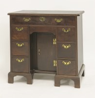 Lot 337 - A George III mahogany kneehole desk