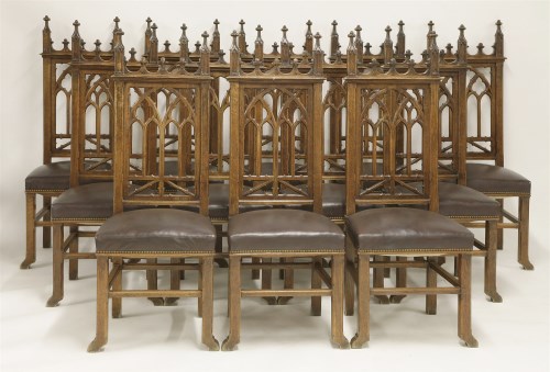Lot 349 - A set of twelve oak Victorian Gothic single dining chairs