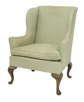 Lot 383 - A George ll-style wing back armchair