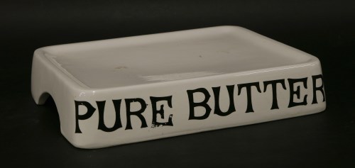 Lot 77 - A pottery 'Pure Butter' shop counter display tray