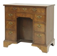 Lot 335 - A George III mahogany kneehole desk