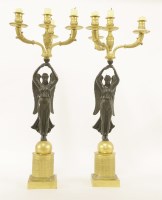 Lot 357 - A pair of gilt bronze candelabra