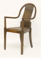 Lot 50 - An oak armchair