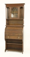 Lot 54 - An Arts and Crafts oak bureau bookcase