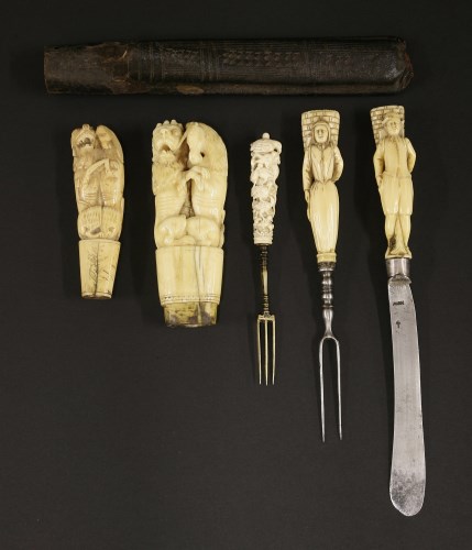 Lot 34 - Two carved ivory knife handles