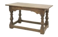 Lot 300 - An oak centre table