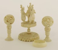 Lot 375 - Two Canton ivory balls on stand