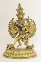 Lot 143 - A gilt-bronze bodhisattva group