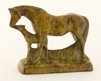 Lot 84 - A pottery model of a mare and a foal