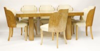 Lot 253 - An Art Deco burr maple dining table