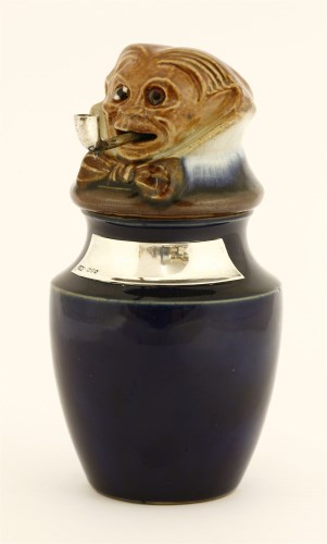 Lot 80 - A Royal Doulton stoneware tobacco jar and cover