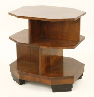Lot 282 - An Art Deco walnut three-tier library table