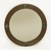 Lot 49 - An Arts and Crafts circular copper wall mirror