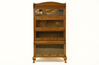 Lot 680 - An oak 'Globe Wernicke' type bookcase