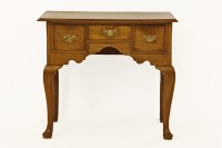 Lot 746 - A Georgian oak lowboy