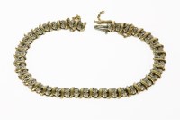 Lot 201 - A 9ct two colour gold two row diamond line bracelet
11.69g